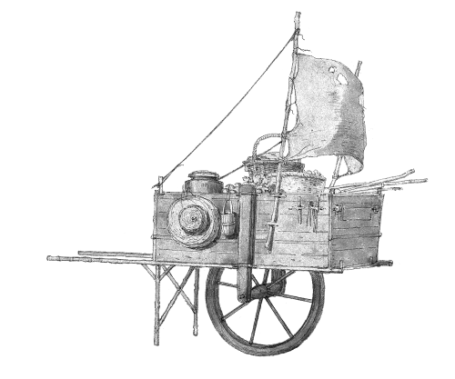 A hand pulled cart with a sail.